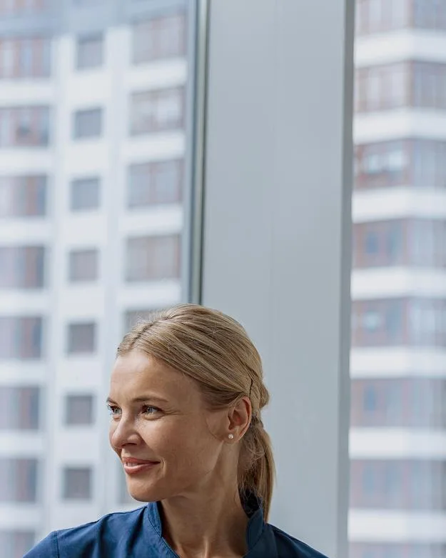 Healthcare IT professional working in a technology environment